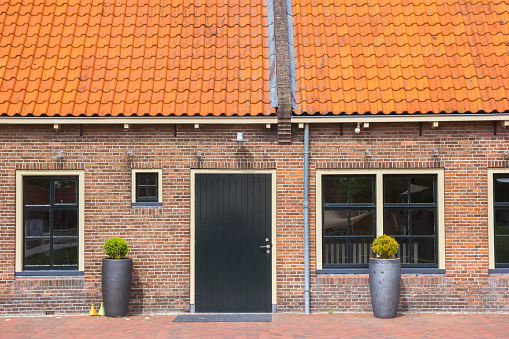 Door and windows of a historic house in Veenhuizen, Netherlands