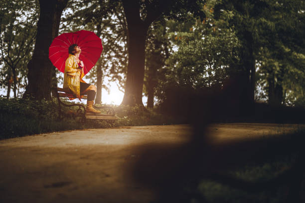 istock Sad woman on rain 1317972917