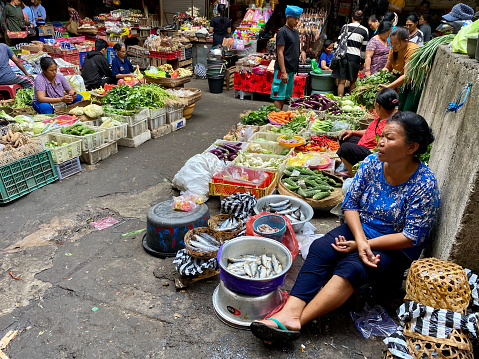 Local Vietnamese eating street food in Ho Chi Minh, Vietnam