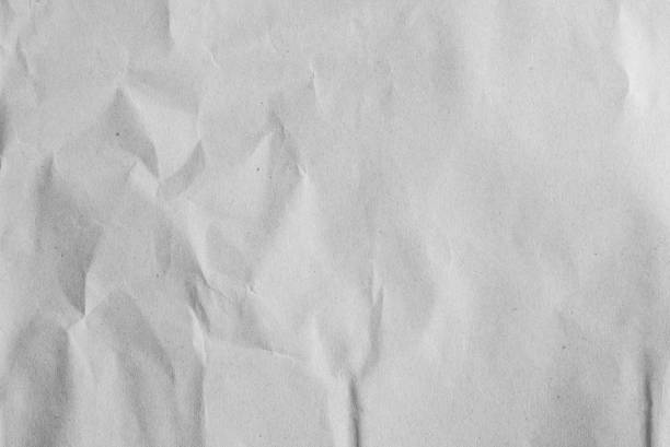 istock crumpled white and gray  paper horizontal background texture for design concept 1317973717