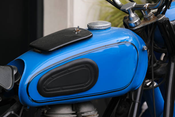 A closeup shot of a cool blue motorcycle