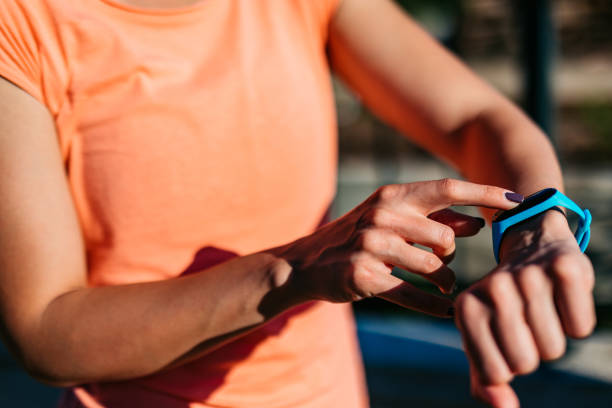 istock Woman checking pulse on the smartwatch 1317975347