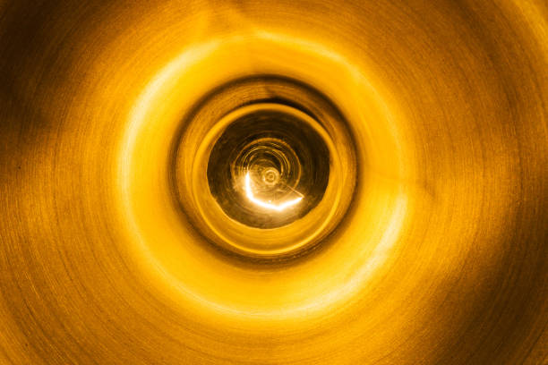 istock Metal lampshade. Ceiling lamp isolated on black. Bright glass light bulb. Light background. 1317975416
