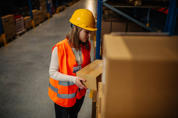 istock Female worker at her job in warehouse 1317976516