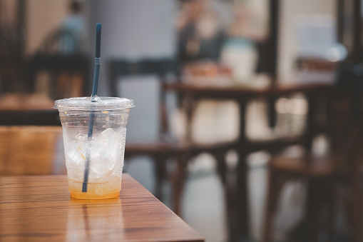 The empty glass with little left iced at cafe