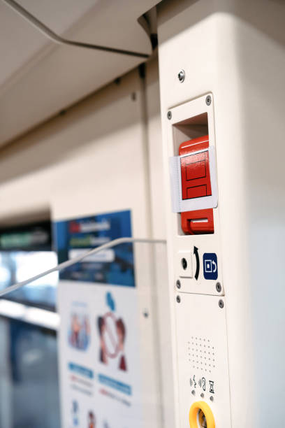 istock the red emergency door release switch control inside the sky train, it's set up beside the door. 1317984818