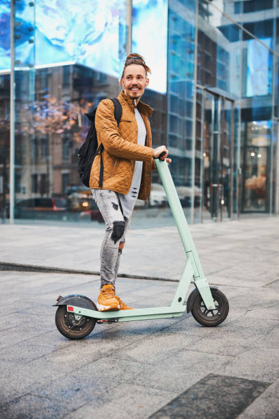 istock Contented man riding around the city and looking happy 1317989907