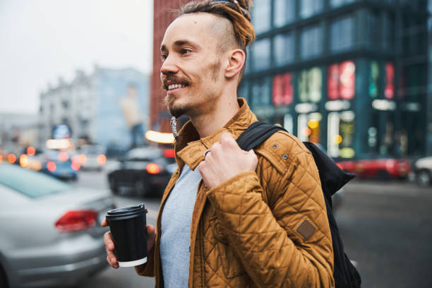 istock Smiling male hipster spending free time in downtown 1317990041
