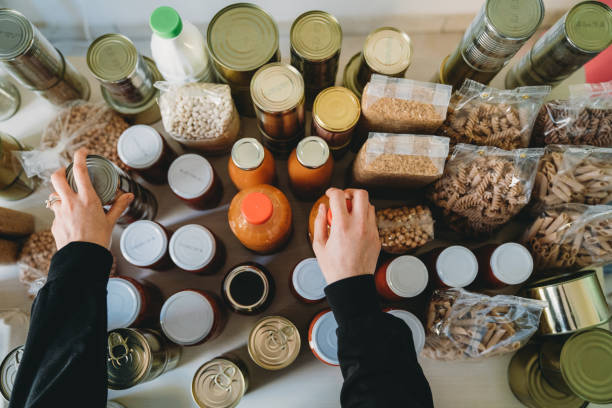 istock Woman is rearranging the kitchen pantry 1317991123