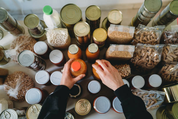istock Woman is rearranging the kitchen pantry 1317991127