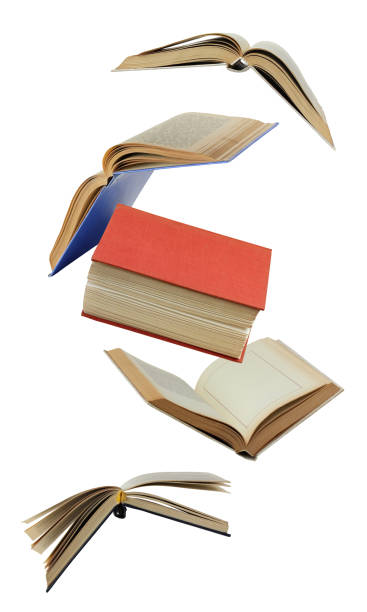 istock open paper books in the air, isolated on a white background. 1317992267
