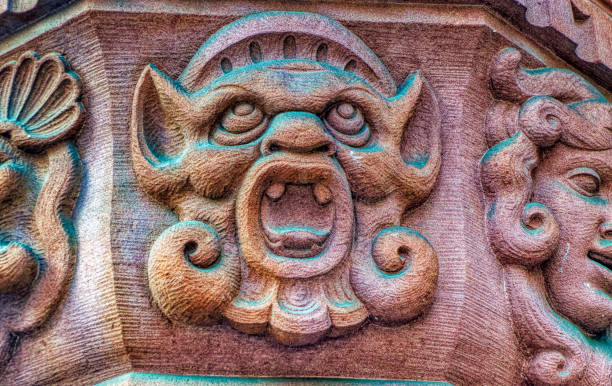 istock Bas relief decorative sculpture on facade of public building. 1317994613