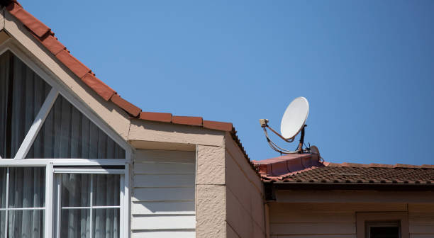 istock satellite dish in front of a blue sky 1317994664