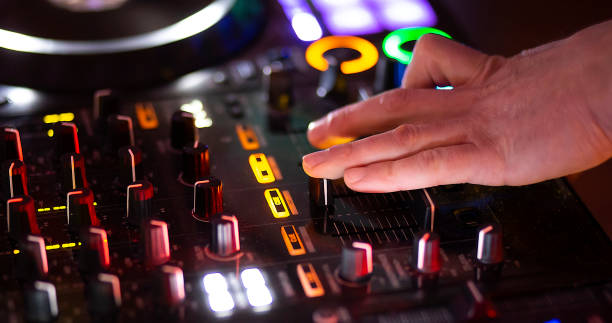 istock dj play on music console in nightclub 1317997054