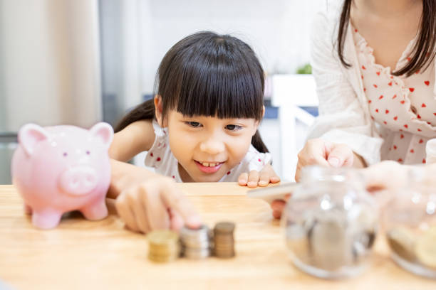 istock Girl learning money planning 1317997166
