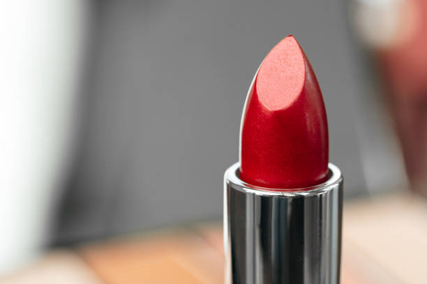 istock New red lipstick on vanity table close up 1317997294