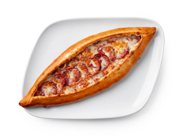 istock Turkish boat-shaped flatbread pide isolated on white 1317998276