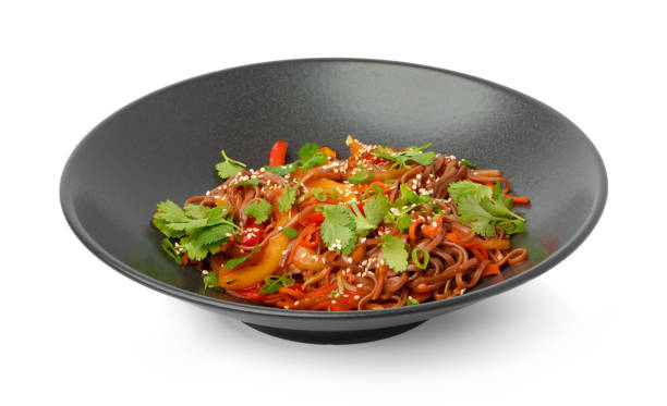 istock Bowl with asian wok noodles isolated on white 1317998532