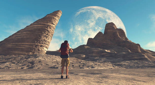 istock Traveler on another planet . This is a 3d render illustration . 1318002914