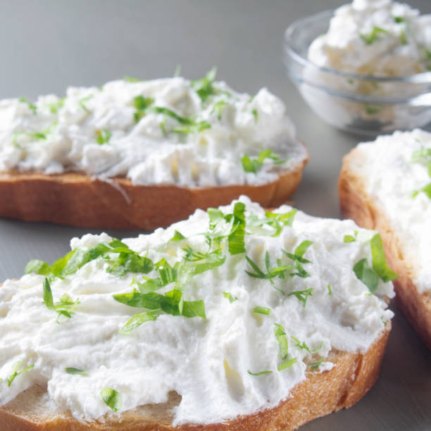 istock cottage cheese sprinkled with herbs on a slice of bread 1318003303