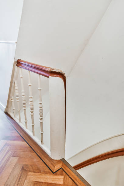 istock Staircase with classic railing in apartment 1318005326