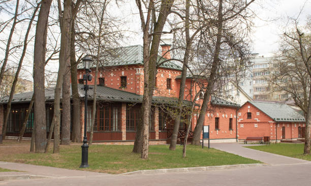 istock Red brick house in the park 1318006549