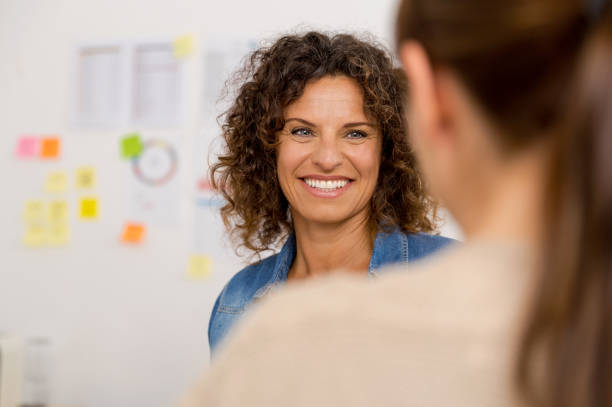Shot of two businesswoman working together in an office
