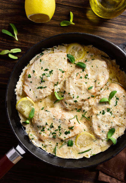 istock Chicken breast in creamy garlic sauce 1318011196