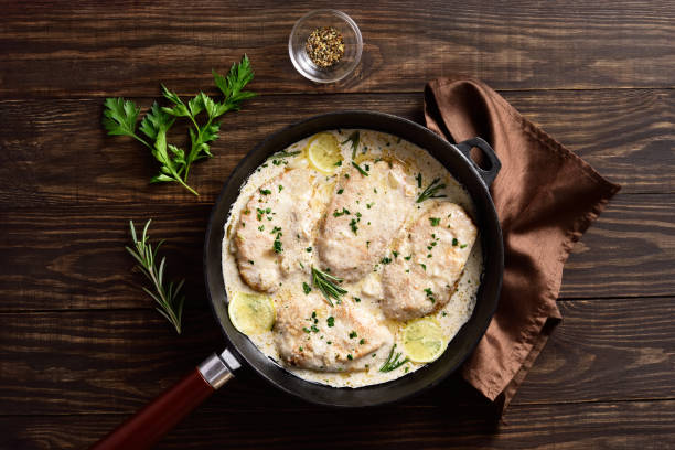 istock Chicken breast in creamy garlic sauce 1318011205