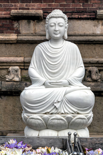 istock Buddha in a Lotus Pose sculpture 1318017719