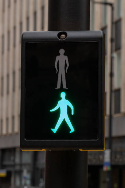 istock Green man light at a pedestrian crossing 1318021834