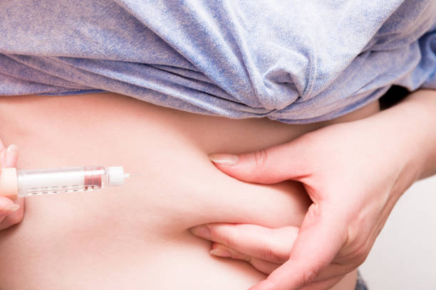 istock female hand makes an injection of insulin 1318026914