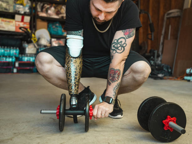 istock Man with disability working out in garage 1318028019