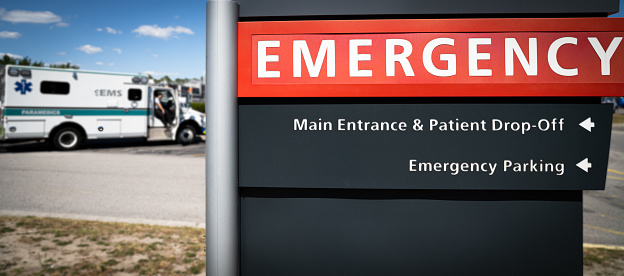 A sign for an Emergency Trauma Center.