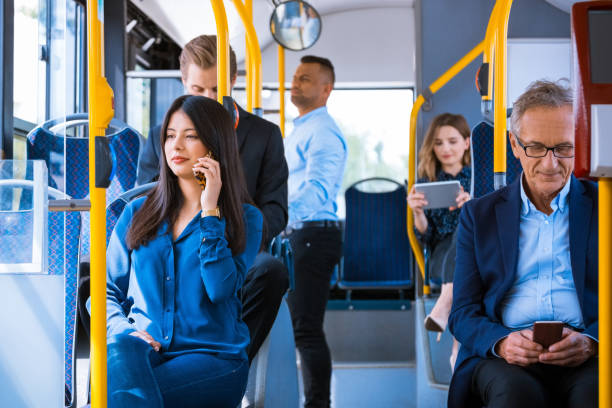 istock Business people commuting in public transport 1318031807