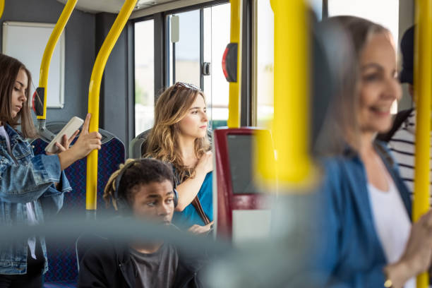 istock Passengers traveling in public transport 1318034122