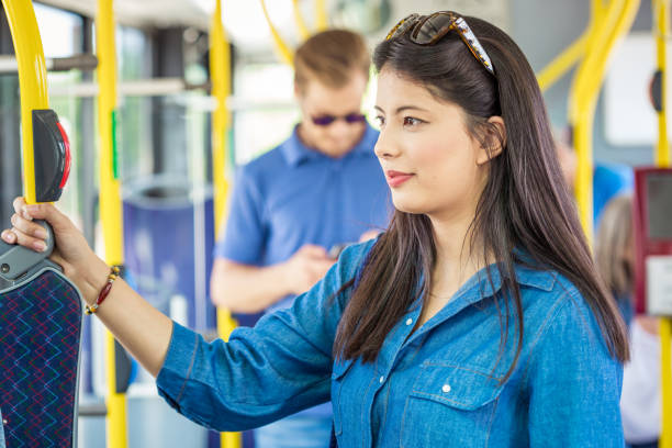 istock Beautiful woman commuting in bus 1318035310