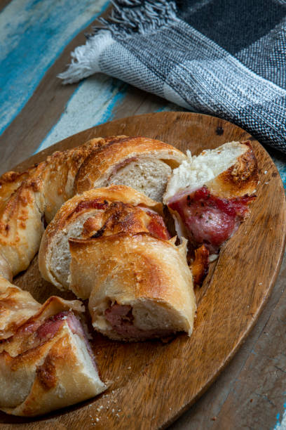 istock Italian bread stuffed with provolone cheese and pepperoni sausage. 1318037701