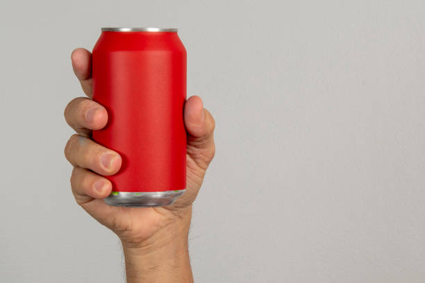 istock male hand holding a red can 1318039186