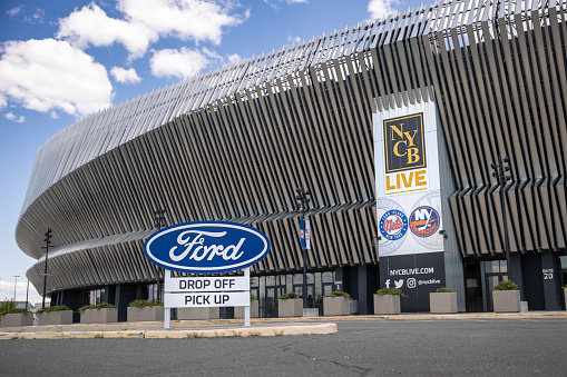 Uniondale, New York - May, 14 2021 :  The Ford drop off and pick up area at the Nassau Coliseum. New York Islanders and Long Island Nets banner
