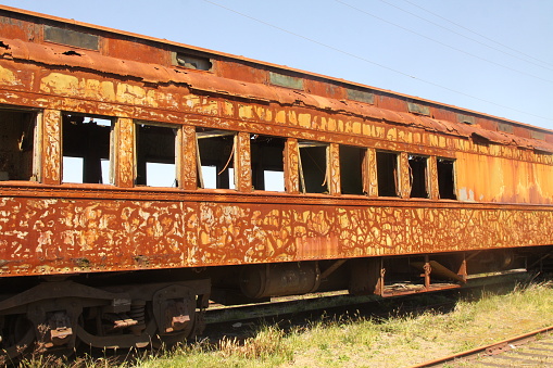 An old rusty and derelict train car