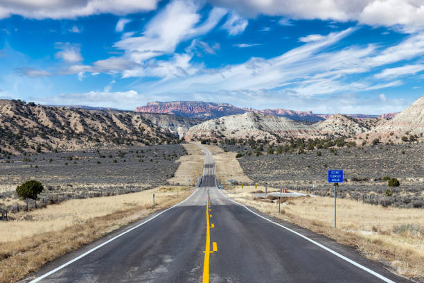 istock View of a scenic route surrounded by mountains in the desert. 1318051925
