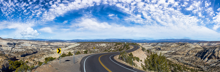 Panoramic View of a scenic route on top of a mountain ridge in the desert. Colorul Blue Sky Art Render. Taken on Route 12, Utah, United States of America.