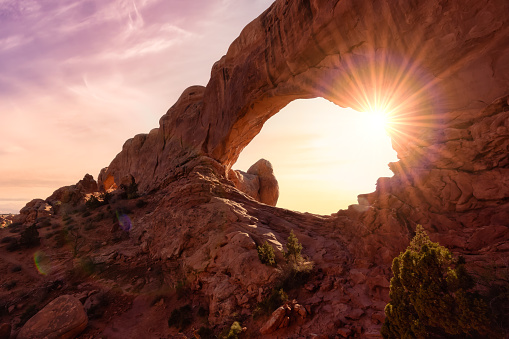 American landscape of an Arch rock formation. Sunset Sky Art Render Taken in Arches National Park, located near Moab, Utah, United States. Nature Background