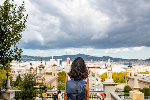 Female Backpacker Enjoying Barcelona View from Montjuic