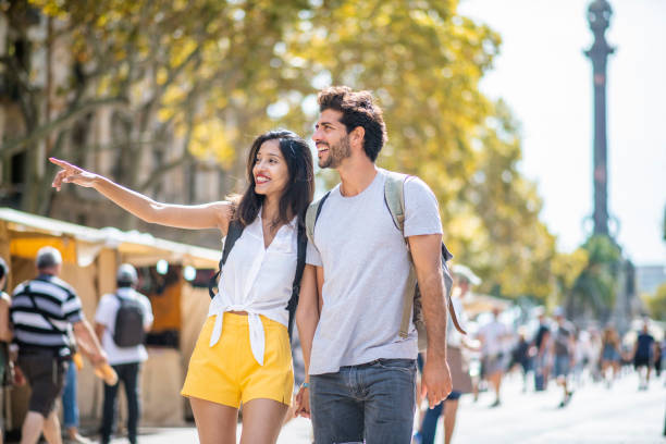 istock Relaxed Young Sightseers Exploring The Ramblas in Barcelona 1318055666