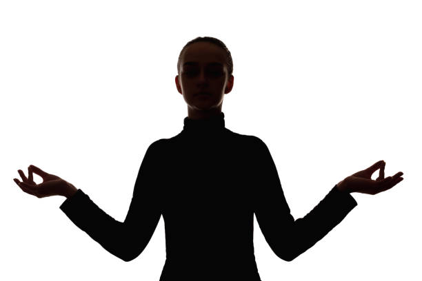 female silhouette meditation therapy inner peace