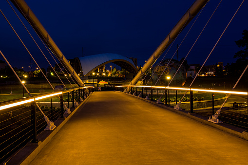 Salem, Oregon, USA - May 13th, 2021: Minto Island Bridge in Salem Riverfront park, Oregon. Night view