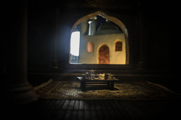 istock A realistic Arabian interior miniature with window and columns. Meals are served before sunrise called Suhur. Festive greeting card, invitation for Muslim holy month Ramadan Kareem. 1318058853