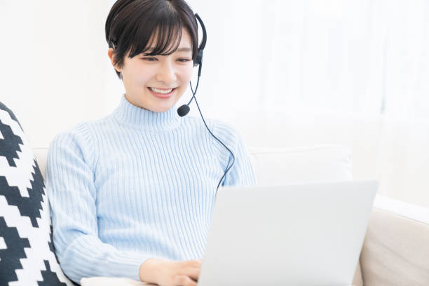 istock young asian woman studying with a PC,correspondence course 1318059169